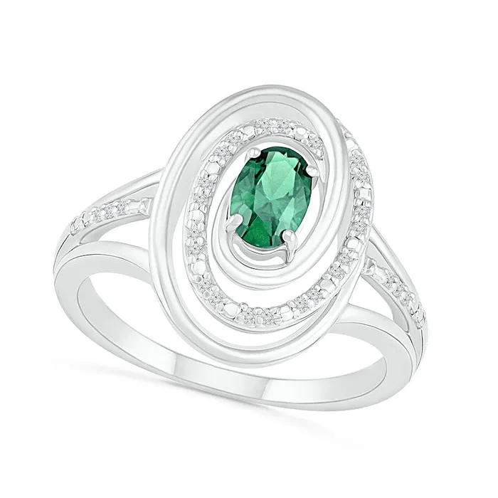 Goldia Oval Emerald and 007 CT TW Natural Diamond Beaded Open Swirl Frame Triple Row Split Shank Ring in Sterling Silver Rings Goldia Oval Emerald and 007 CT TW Natural Diamond Beaded Open Swirl Frame Triple Row Split Shank Ring in Sterling Silver Rings