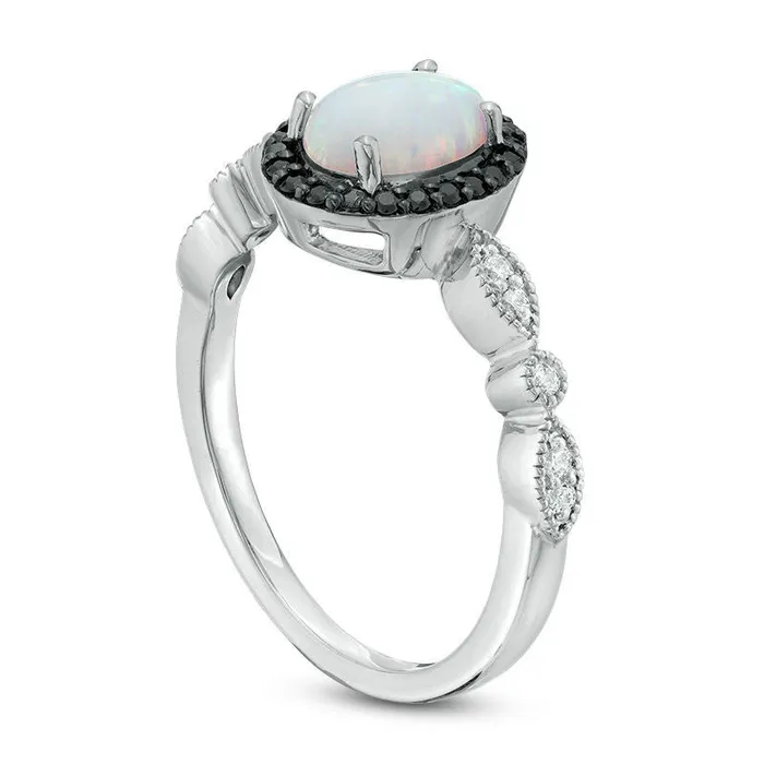 Goldia Rings Oval LabCreated Opal and 013 CT TW Enhanced Black and White Diamond Frame Ring in Sterling Silver Goldia Rings Oval LabCreated Opal and 013 CT TW Enhanced Black and White Diamond Frame Ring in Sterling Silver