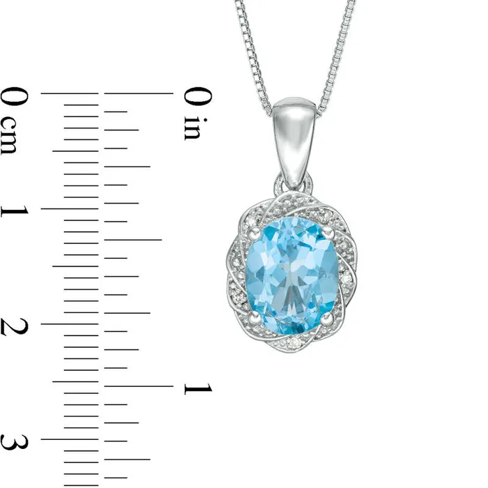 Necklaces Goldia Oval Blue Topaz and Natural Diamond Accent Pinwheel Frame Pendant in Sterling Silver Necklaces Goldia Oval Blue Topaz and Natural Diamond Accent Pinwheel Frame Pendant in Sterling Silver