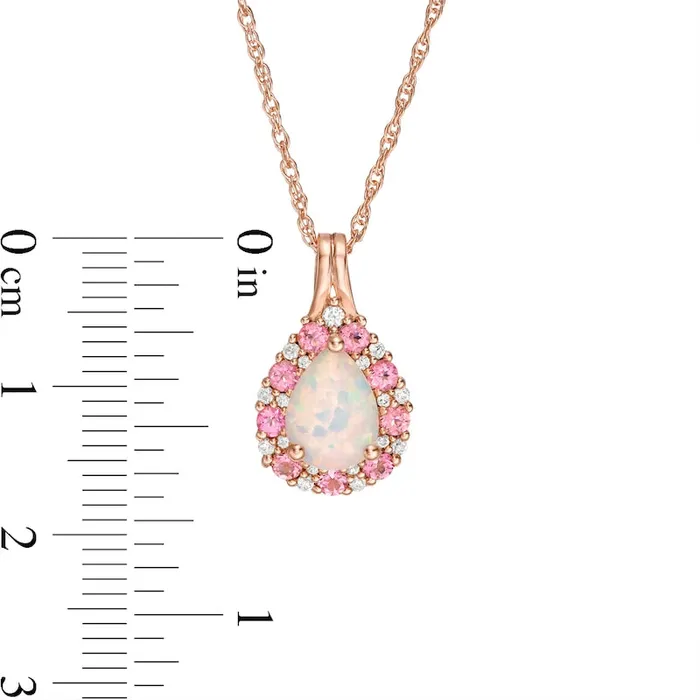 Necklaces PearShaped LabCreated Opal Pink and White Sapphire Frame Teardrop Pendant in Sterling Silver with 14K Rose Gold Plate Goldia Necklaces PearShaped LabCreated Opal Pink and White Sapphire Frame Teardrop Pendant in Sterling Silver with 14K Rose Gold Plate Goldia