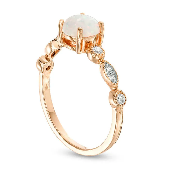 Rings 60mm LabCreated Opal and 010 CT TW Diamond Antique VintageStyle Ring in Solid 10K Rose Gold Goldia Rings 60mm LabCreated Opal and 010 CT TW Diamond Antique VintageStyle Ring in Solid 10K Rose Gold Goldia