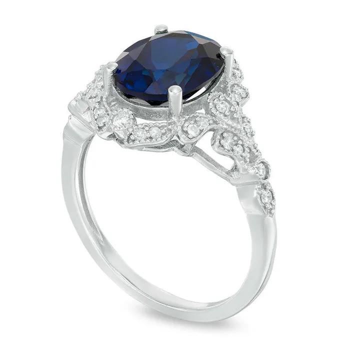 Rings Oval LabCreated Blue Sapphire and 020 CT TW Diamond Antique VintageStyle Frame Ring in Solid 10K White Gold Goldia Rings Oval LabCreated Blue Sapphire and 020 CT TW Diamond Antique VintageStyle Frame Ring in Solid 10K White Gold Goldia